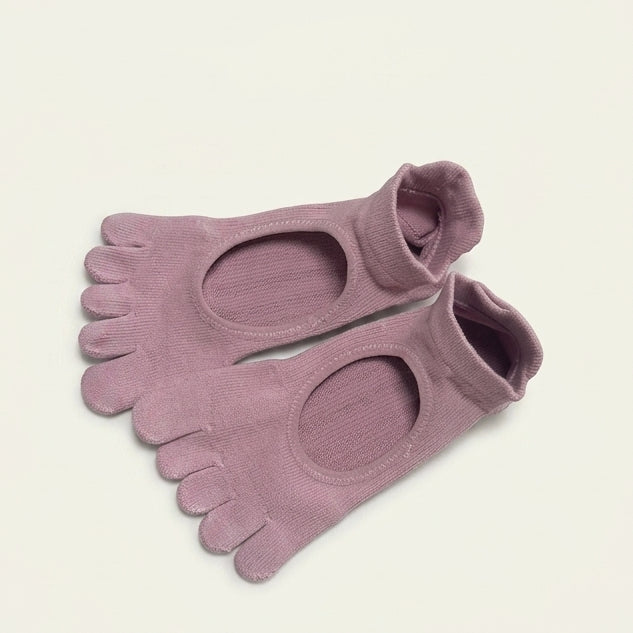 ARCHE dusty mauve five-toe grip socks with a minimalist open-top design for Pilates, barre, yoga and studio workouts.