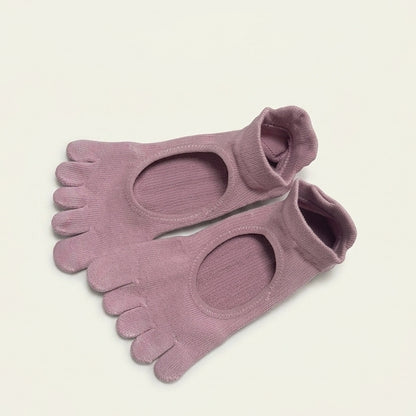 ARCHE dusty mauve five-toe grip socks with a minimalist open-top design for Pilates, barre, yoga and studio workouts.