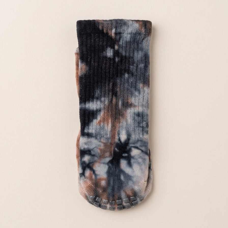 ARCHE earthy charcoal boho tie-dye crew socks with black, grey and rust tones, featuring non-slip traction for Pilates, barre, yoga and studio workouts.