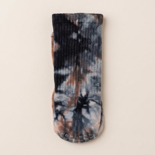 ARCHE earthy charcoal boho tie-dye crew socks with black, grey and rust tones, featuring non-slip traction for Pilates, barre, yoga and studio workouts.
