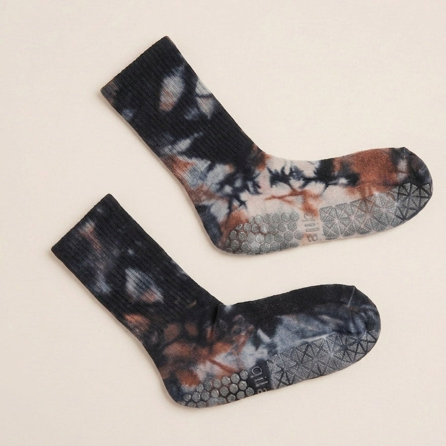 Earthy charcoal tie-dye grip crew socks by ARCHE featuring textured non-slip soles for Pilates, barre, yoga and studio workouts.