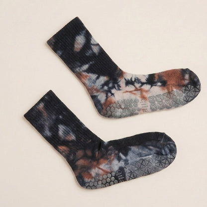 Earthy charcoal tie-dye grip crew socks by ARCHE featuring textured non-slip soles for Pilates, barre, yoga and studio workouts.